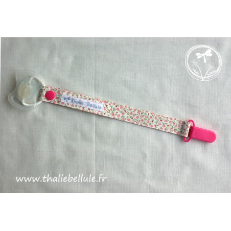 Attache tétine à fleurs roses, avec une pince plastique rose fuchsia