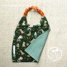 serviette élastiquée motifs verts dragon et chevalier, doublée en nid d'abeille vert
